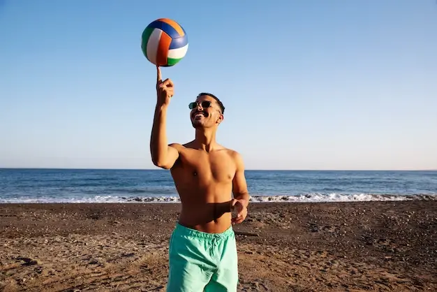 jugadores de voleibol de playa con gafas de sol